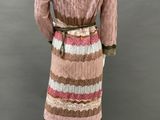 a mannequin dress with multicolored stripes on a mannequin mannequin mannequin mannequin mannequin mannequin manne