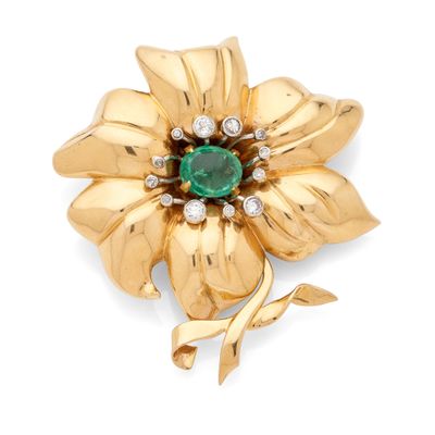 an emerald and diamond flower broochle, by van cleef