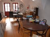 a dining room with a table and chairs in it