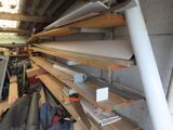 a lot of shelves that are stacked up in a garage