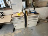 an image of a kitchen with a refrigerator and cabinets in it