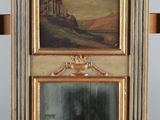 a mirror with a painting on it and a cross in front of it