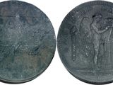 an image of a coin with a picture of a man and a woman on it