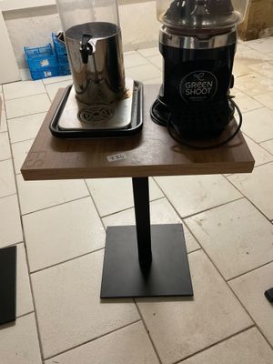 a blender sitting on top of a table in a kitchen