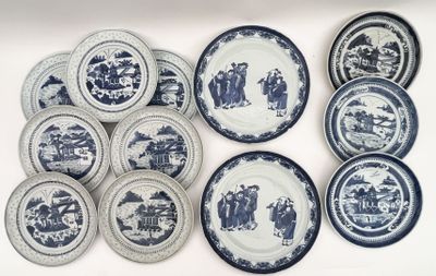a lot of plates that are sitting on a table