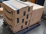 many boxes stacked on top of each other on a pallet