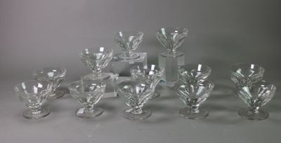 a lot of glass vases that are sitting on a table