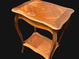 an image of a wooden table with a shelf underneath it