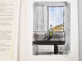 an open book with a drawing of a bottle and a bottle of wine on a table