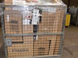 a large metal cart with boxes on it in a warehouse