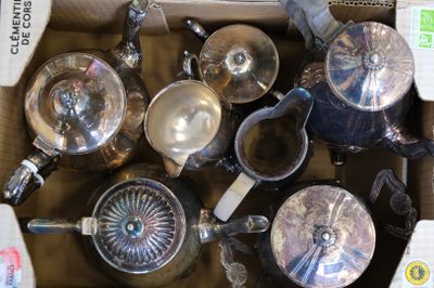 a box full of silver pots and pans in it