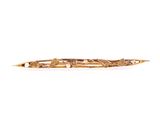 a close up of a gold plated hair clip on a white background