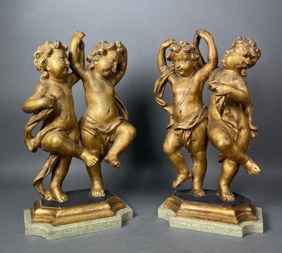 pair of antique bronze figurines of cherenshes on marble bases