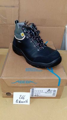 a box with a pair of black shoes on it