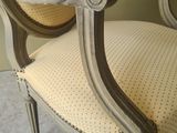 a chair that is sitting in the corner of a room