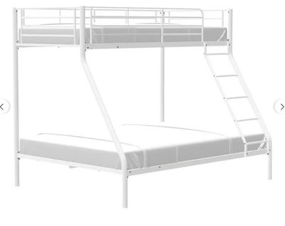 the bunk bed is white and has a ladder on top of it