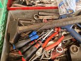 a box full of tools that are sitting on a table