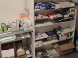 many boxes and boxes on the shelves in the room