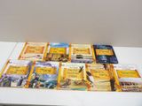a lot of books that are sitting on a table