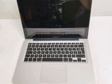 a laptop computer that is sitting on a table