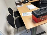 a table with a toolbox on it in a room