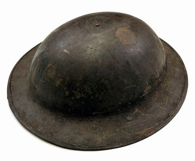 a helmet on a white surface with a white background