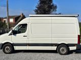 a white van that is parked in a parking lot