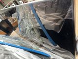 a picture of a broken laptop computer sitting on a table
