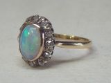 an image of an oplite and diamond ring