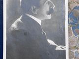 an old photo of a man in a suit and tie