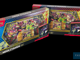 two boxes of pokemon trading cards are shown on a black background