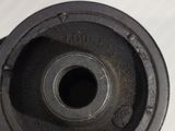a close up of a black object on a white surface