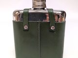 green leather flask with a stainless steel hip flask in it