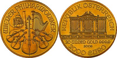 un gros plan d'une pièce d'or sur laquelle est représenté un instrument de musique