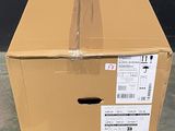 a cardboard box that is sitting on the floor
