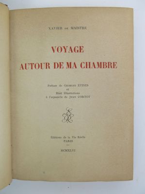 an open book with a picture of a woman in a red dress