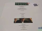 an image of a sheet of paper with a picture of a man in a suit