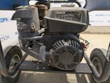 a small engine that is sitting on a cart