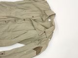an image of a military jacket laying on top of a white surface