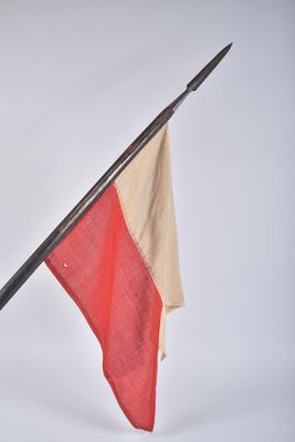 a red and white flag on a pole on a white background