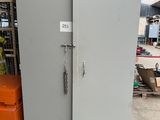 a refrigerator that is sitting in the middle of a warehouse