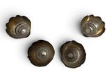 four metal knobs on a white surface with a white background