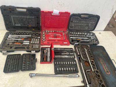 a lot of tools that are sitting on a table