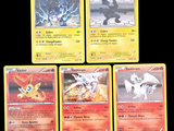 four pokemon cards are shown on a black background with a black background