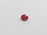 a red ruby gems on a white surface