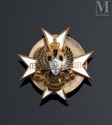 an image of a gold and blue star badge with a crown
