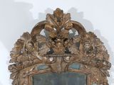 a mirror that is sitting on the wall