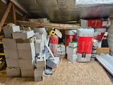 a pile of boxes and boxes on the floor in a room