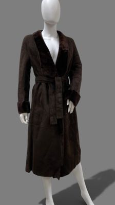 an image of a mannequin dressed in a brown coat