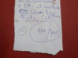 un bout de papier sur lequel est collée une note